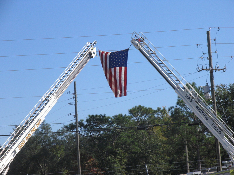 Welcome Home 842nd: Flag across the Highway