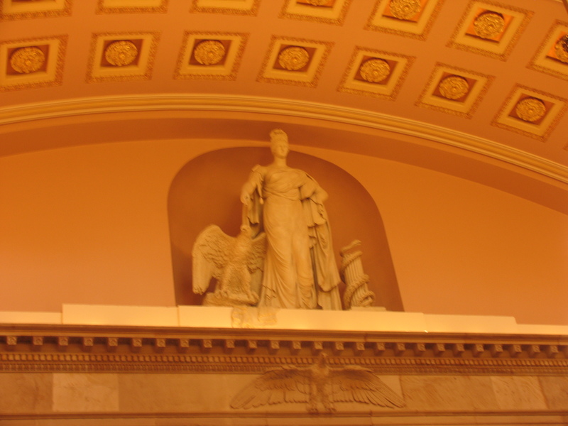 Liberty, above the old House Chamber, now the hall of statues.