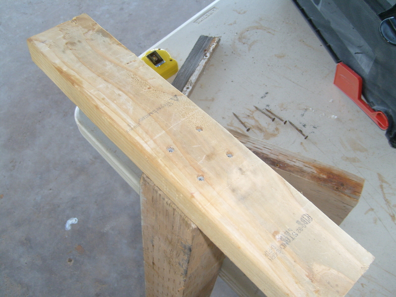 Here is the T, four screws, 2.5 inches each, attaching the 2x4 to the post.