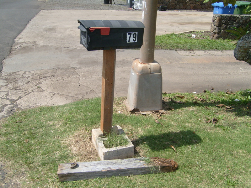 The old post is removed and the new post is in place. I packed in rocks and gravel around the post, much like we had before.