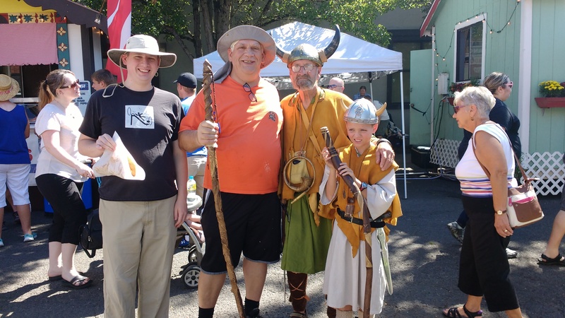 Isaac and Don posing with a viking and his squire.